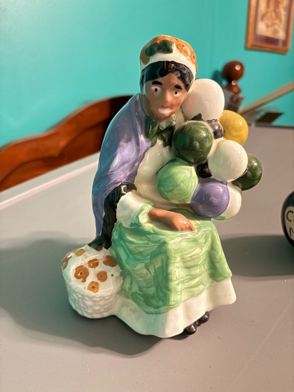 Royal Doulton "The Old Balloon Seller," model number HN 1315.